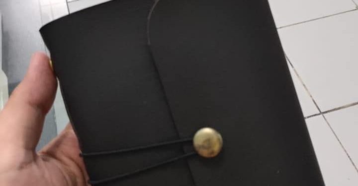 Hibrkraft User Generated Content Black Notebook Hand