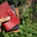 10100522 Hibrkraft Hand Holding Leather Notebooks