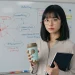 Woman With Coffee Notes Board