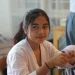 Girl In White Shirt Classroom Portrait