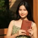 Woman Holding Brown Notebook Outdoor