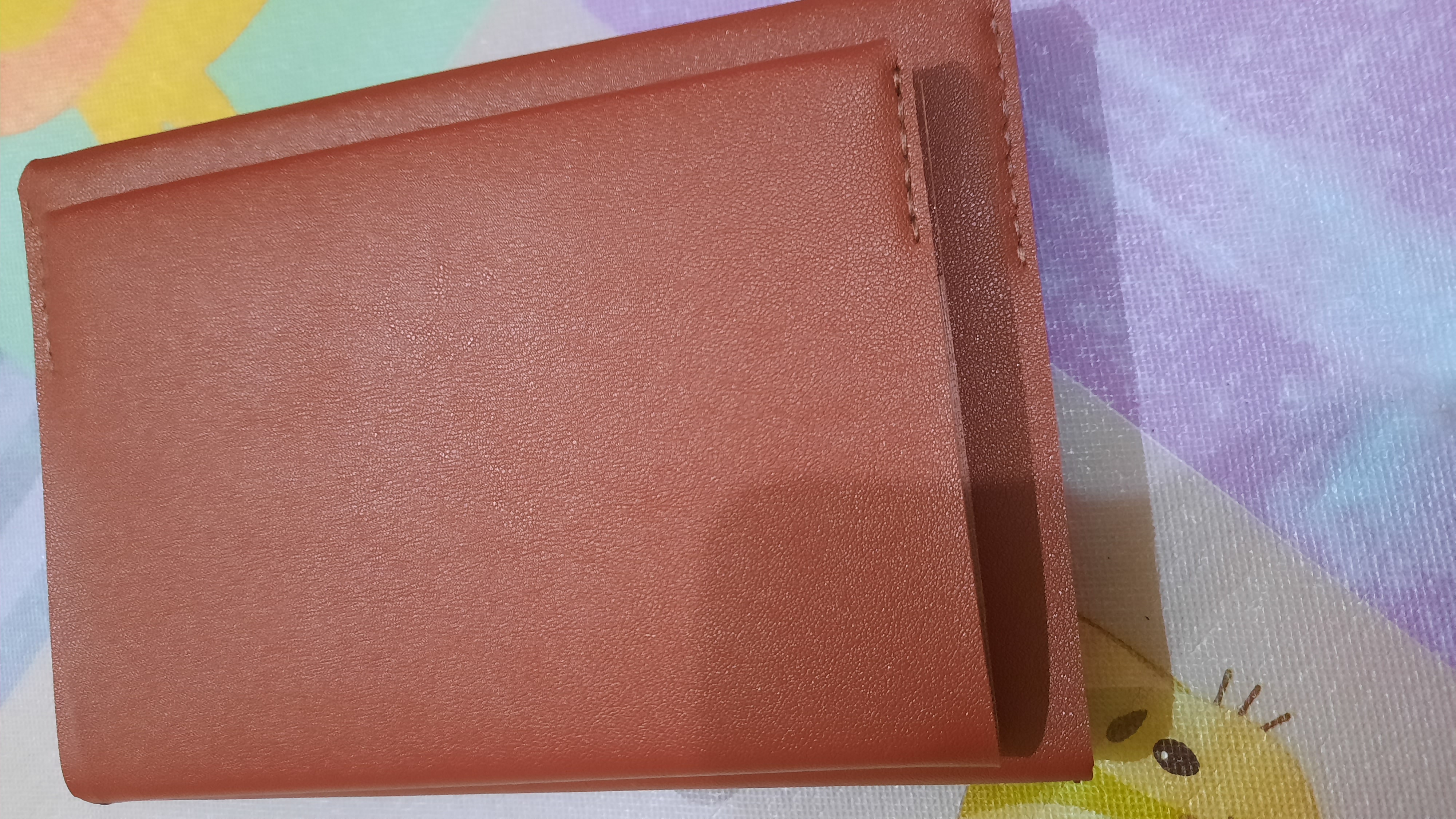 Restorasi Buku Hibrkraft - brown-leather-book-sleeve.jpg